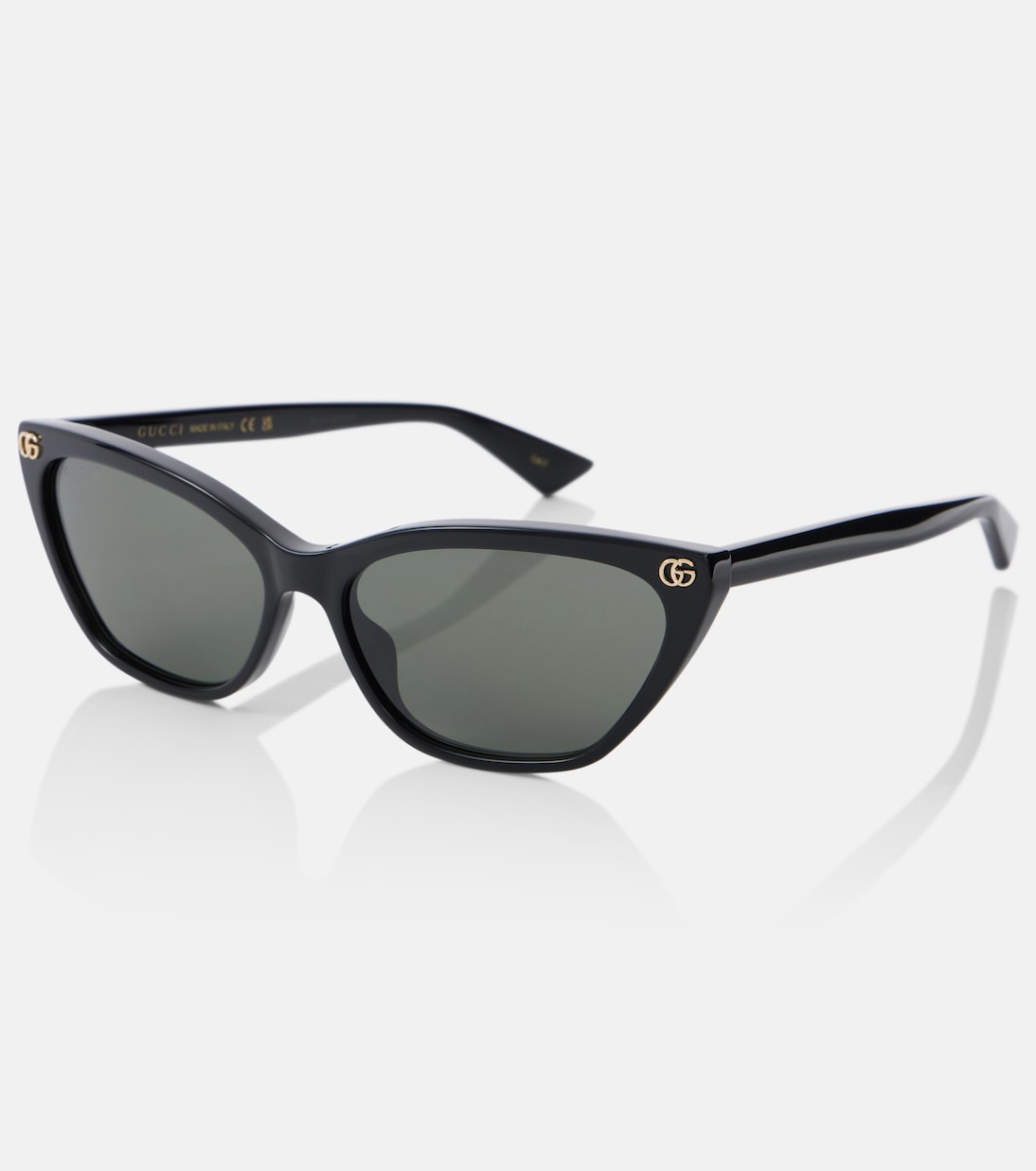 Occhiali da sole cat-eye GUCCI con logo Double G, stile giovanile e moda italiana.