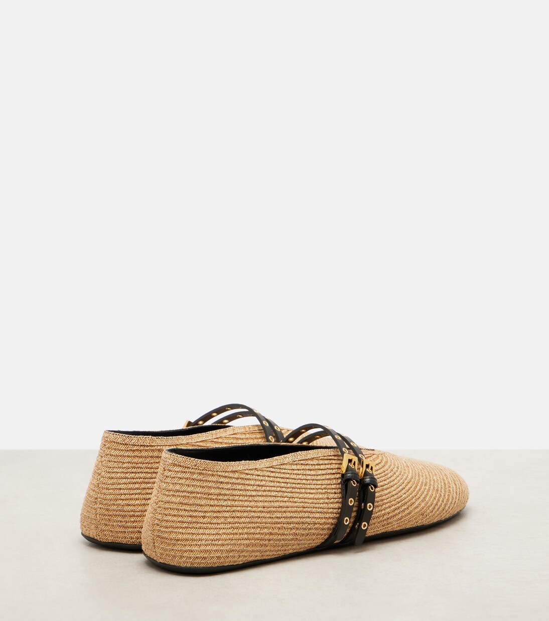 Leather-trimmed straw ballet flats | Alaïa