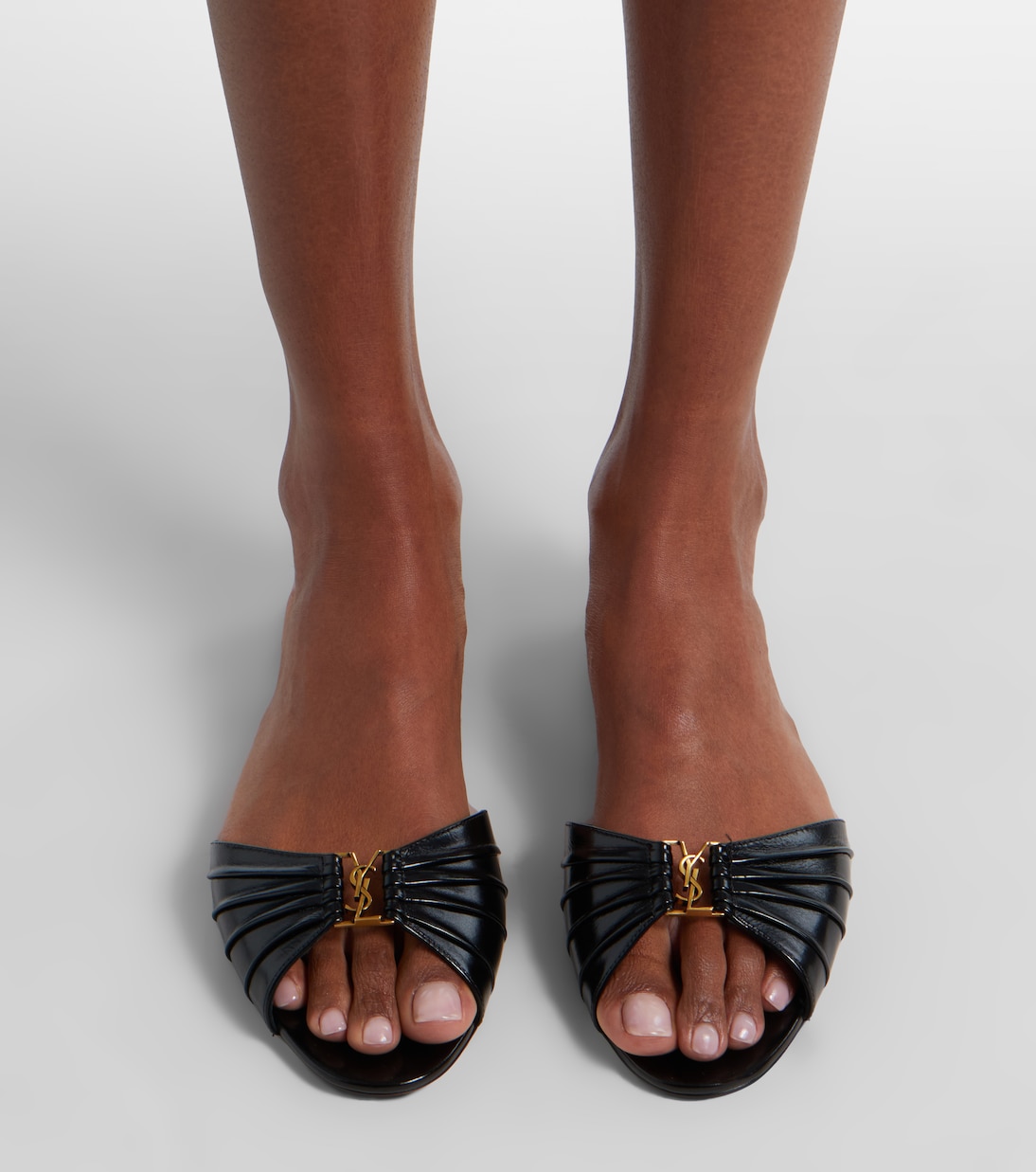 Cassandre leather slides | Saint Laurent