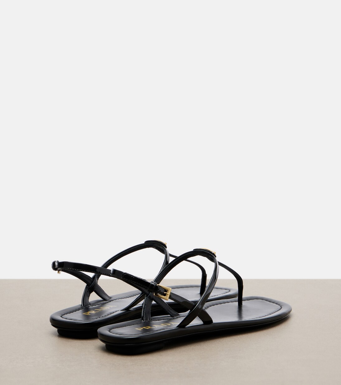 Patent leather thong sandals | Prada