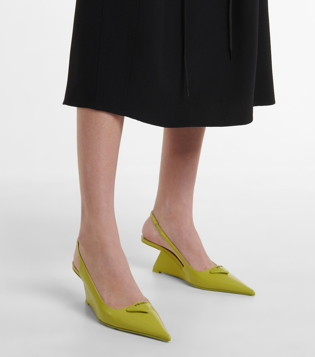 Logo slingback leather pumps in green Prada Mytheresa