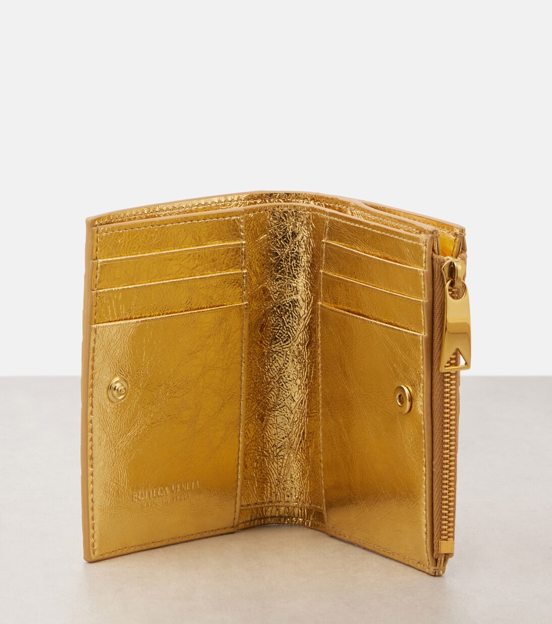 Portafoglio Bifold in Pelle Intrecciato BOTTEGA VENETA, Design Compatto e Moderno per Giovani Stilisti