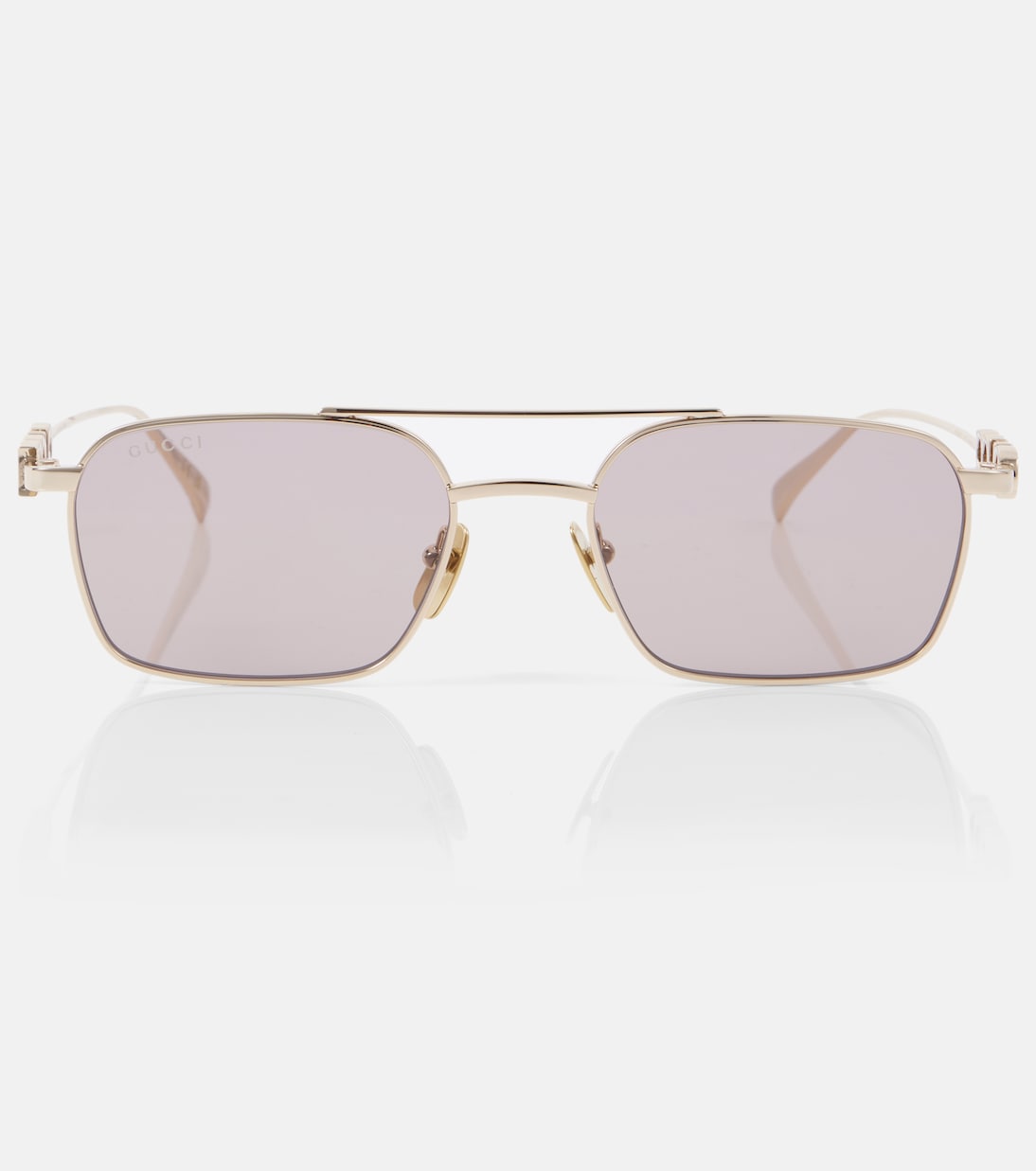 Occhiali da sole aviator GUCCI con dettagli in script, stile giovane e trendy.