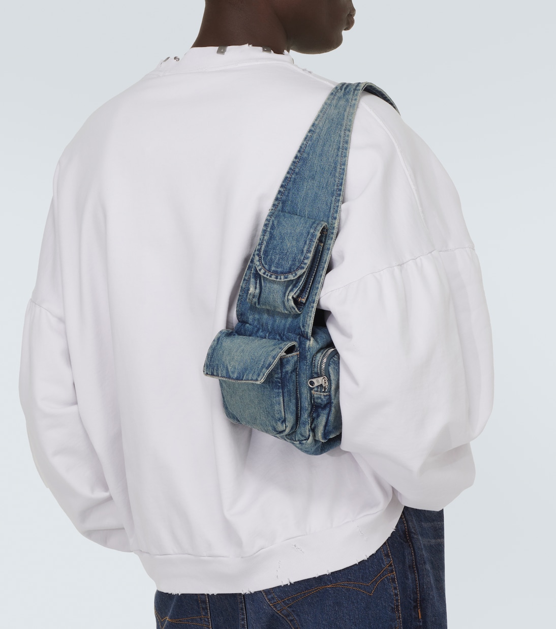 Superbusy Sling Small denim shoulder bag in blue Balenciaga Mytheresa