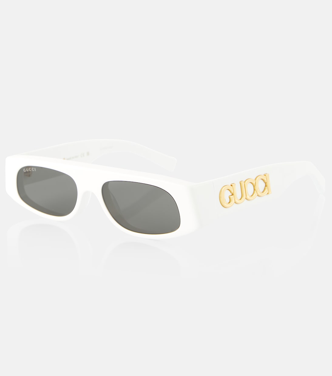 Occhiali da sole rettangolari GUCCI per sfilata, stile giovane e trendy