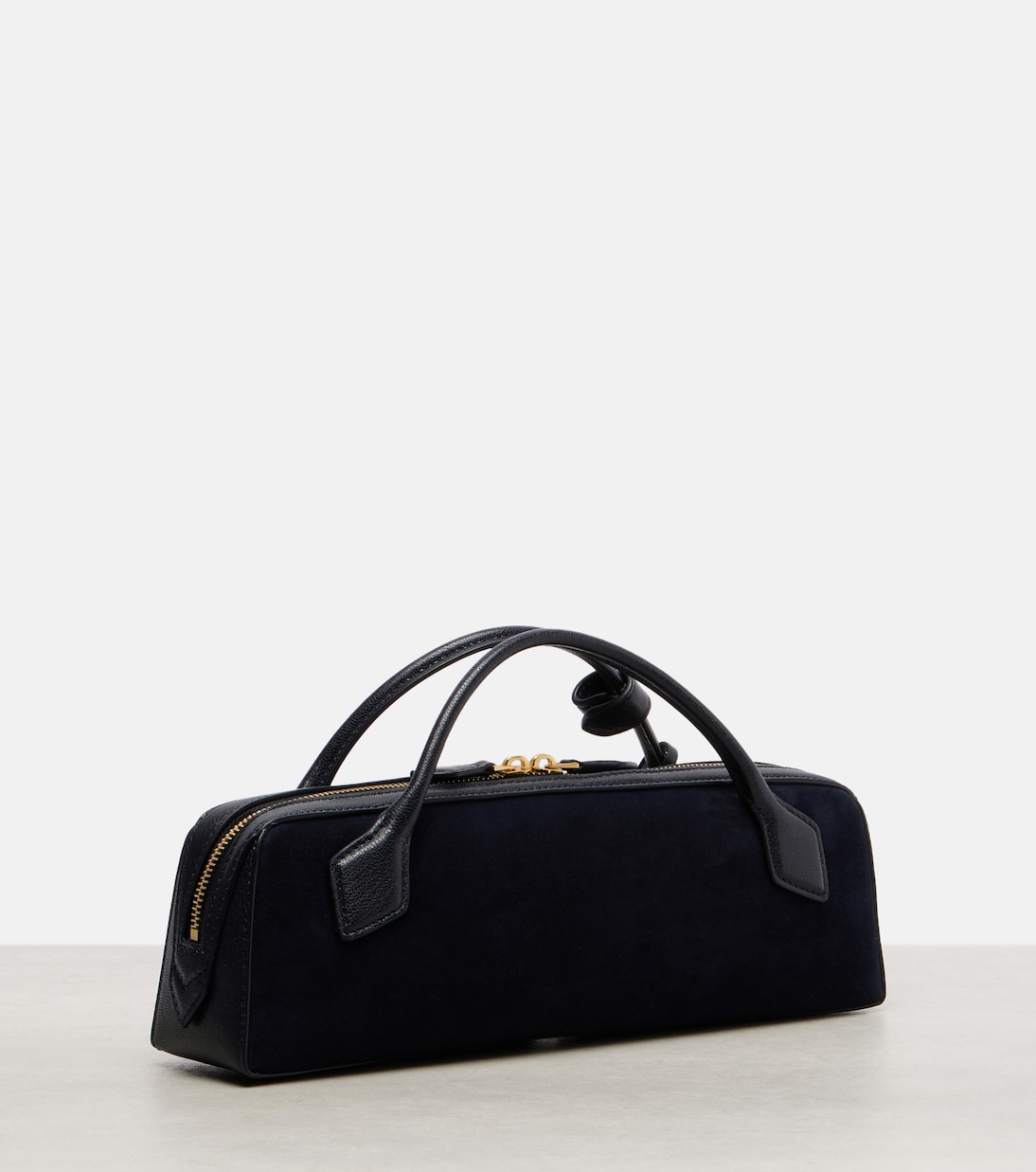 Le Teckel Small calf hair clutch | Alaïa