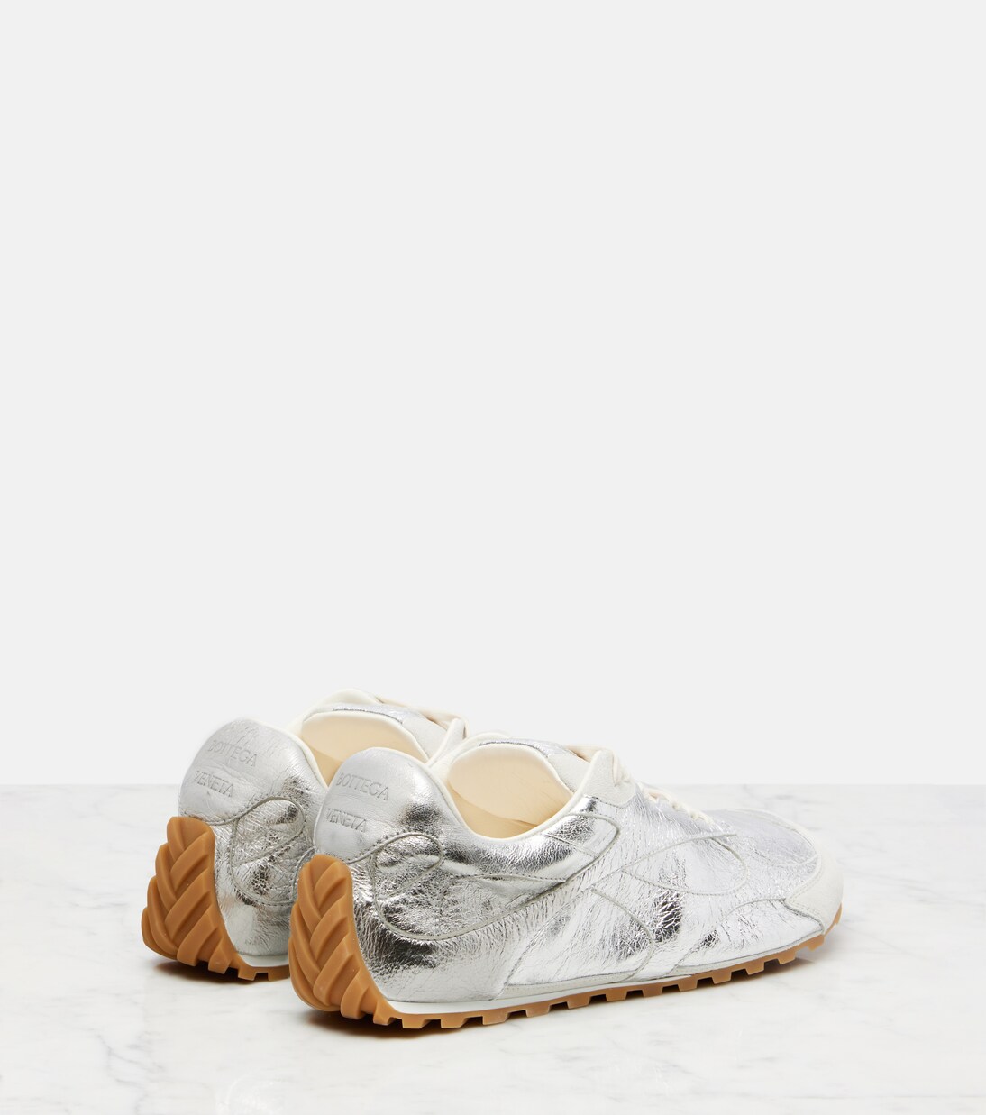 Orbit Flash金属感皮革运动鞋 | Bottega Veneta