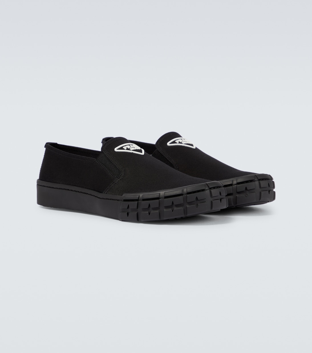 Cassetta Wheel slip on sneakers in black Prada Mytheresa