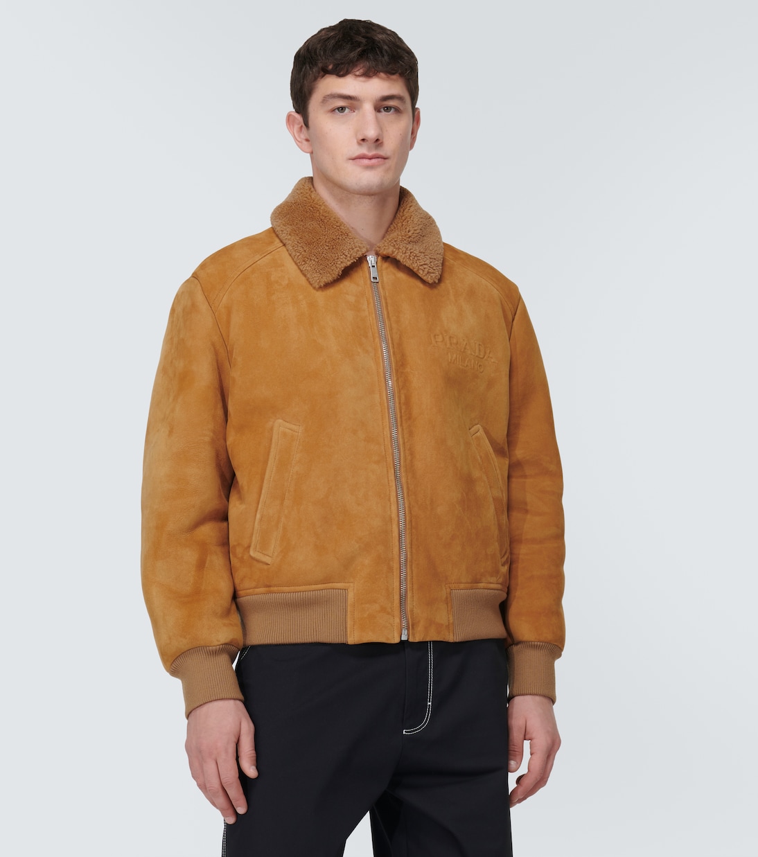 Shearling-trimmed suede bomber jacket | Prada
