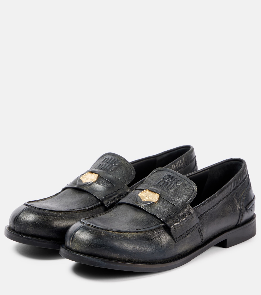 Scarpe in pelle Miu Miu stile penny loafer per giovani alla moda