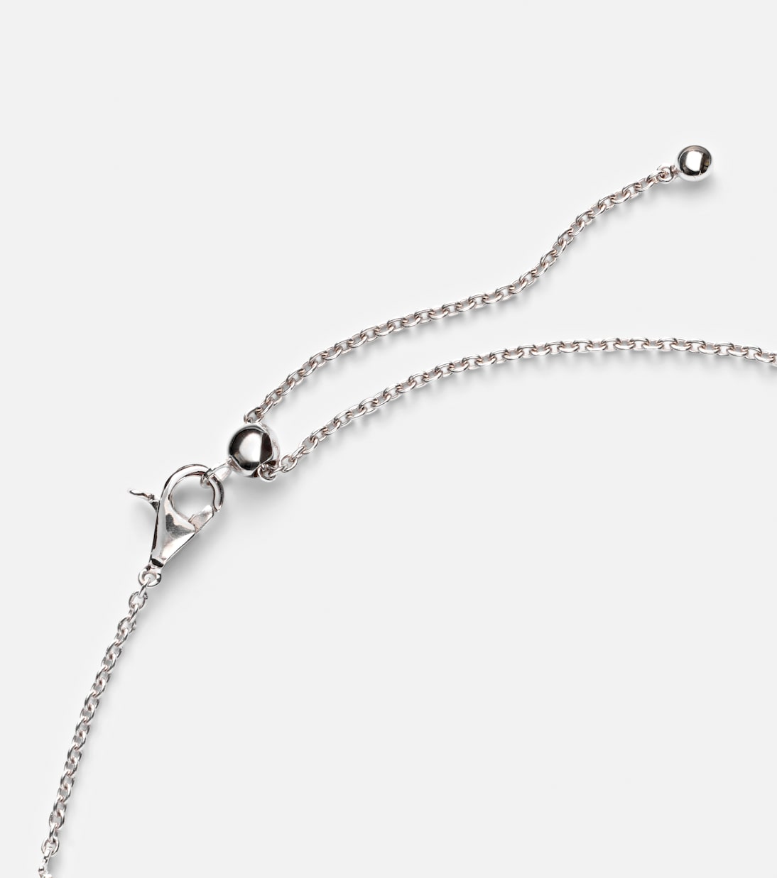 Halskette aus 18kt Weißgold mit Diamanten und Smaragden | Kamyen