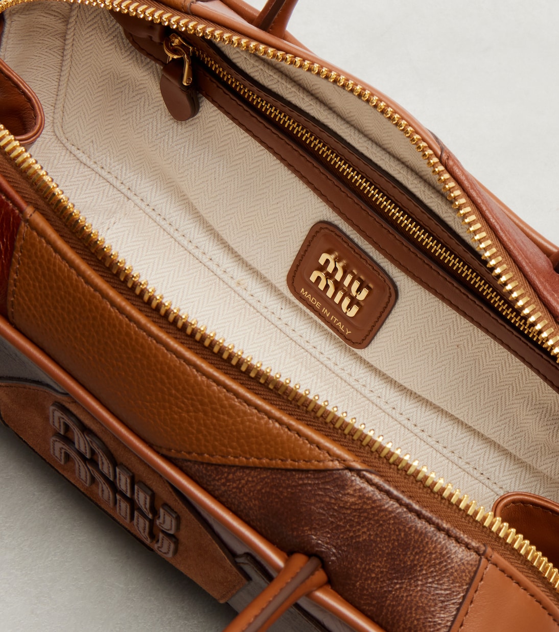 Beau Small leather top-handle bag | Miu Miu