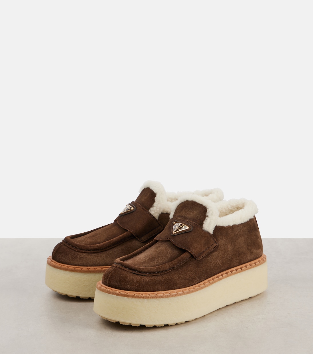 Shearling-lined suede platform loafers | Prada