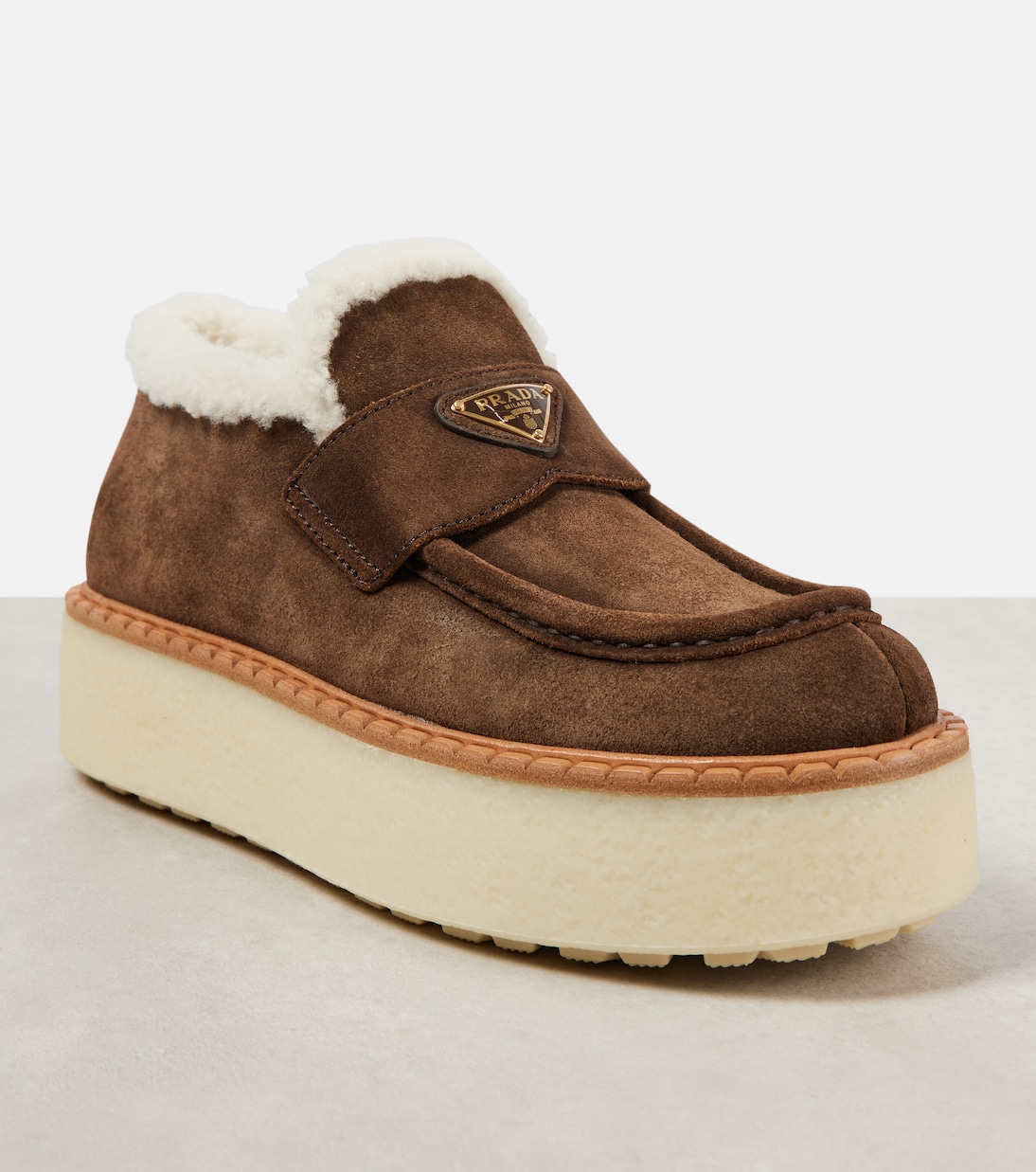 Shearling-lined suede platform loafers | Prada