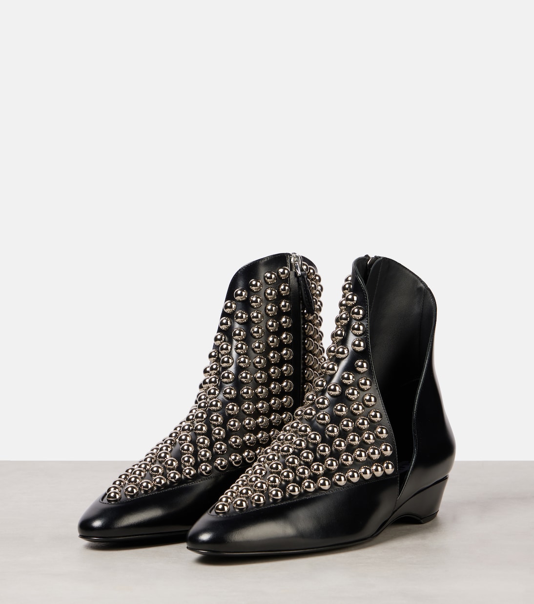 Stivaletti in pelle con borchie | Alaïa