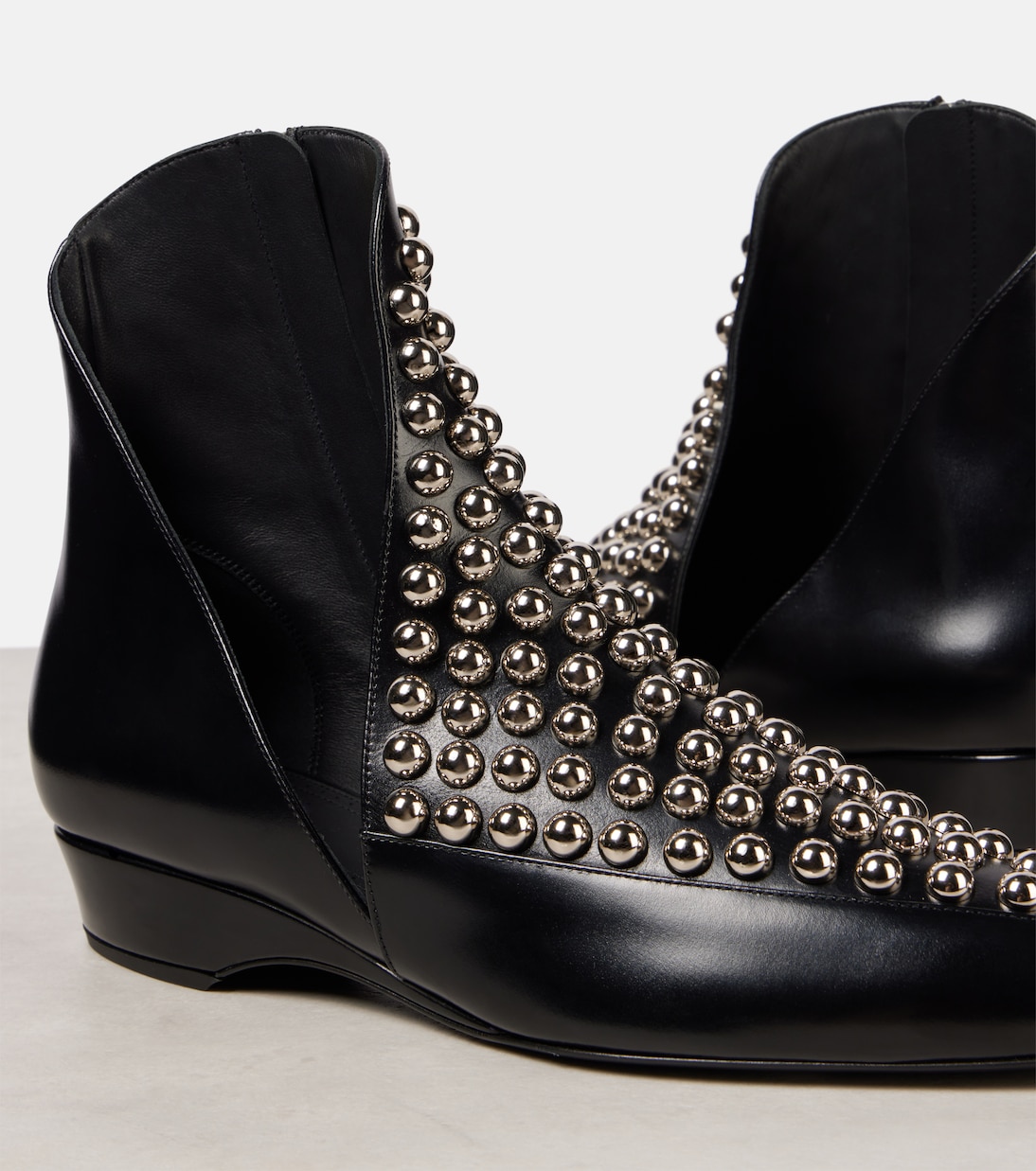 Stivaletti in pelle con borchie | Alaïa