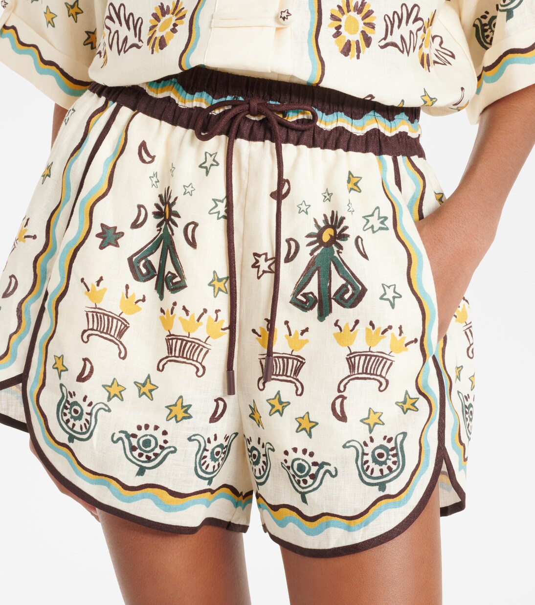 Sun Dancer printed linen shorts | Alémais