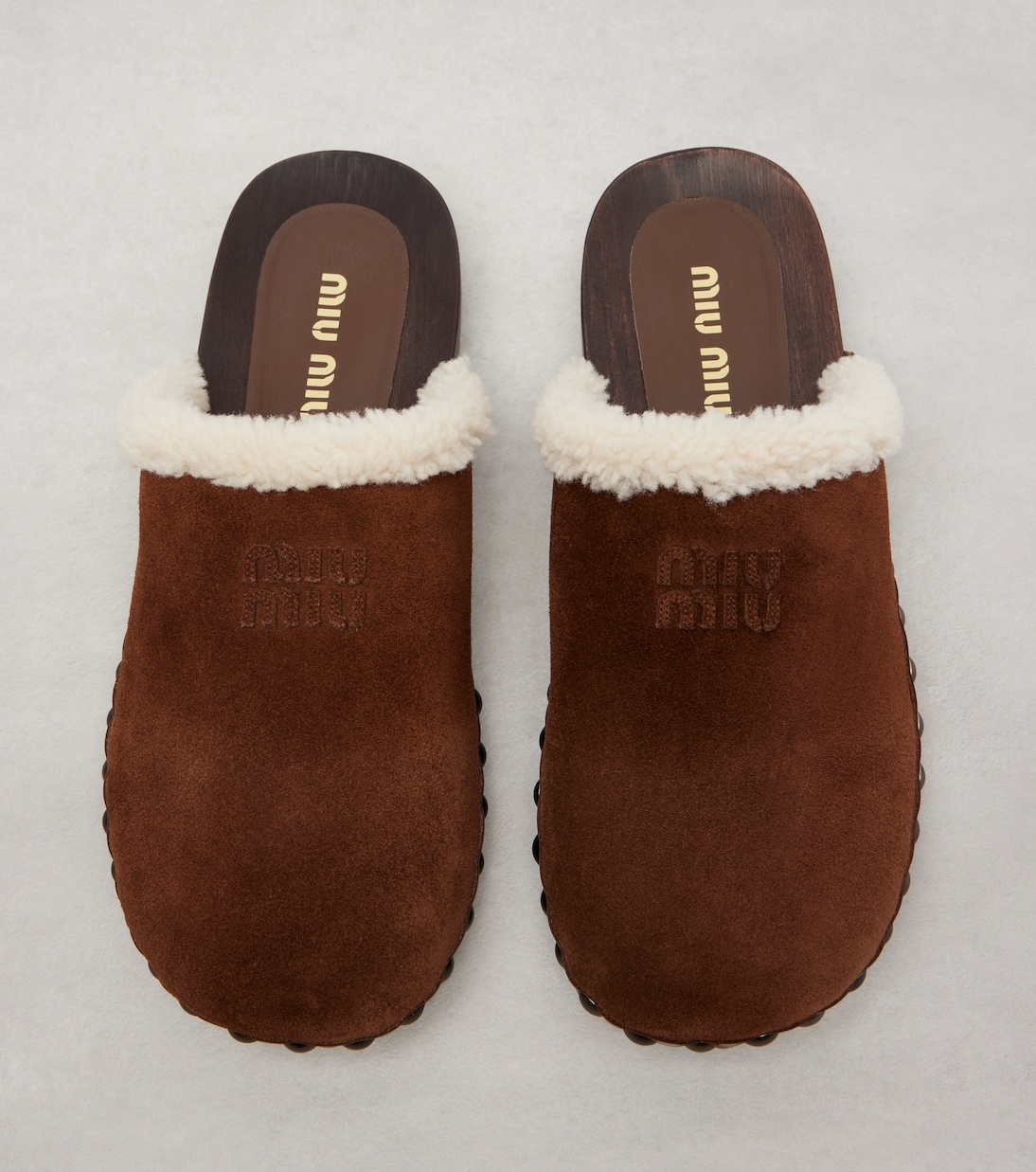 Shearling-lined suede clogs | Miu Miu