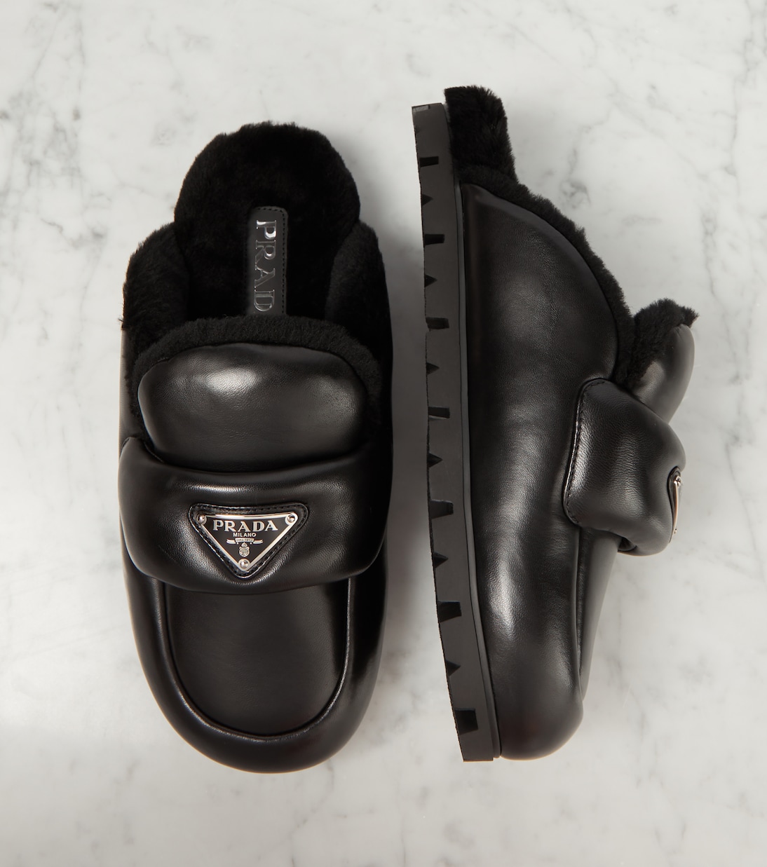 Shearling-lined leather slides | Prada