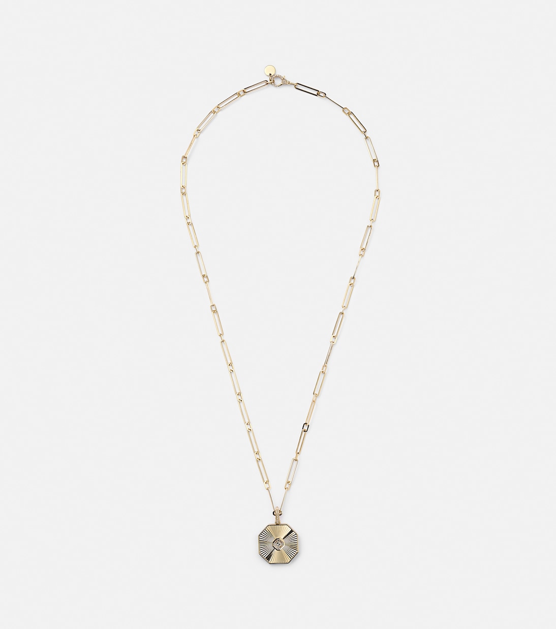 Collana giovanile in oro 18kt con pendente diamantato a forma ottagonale, design moderno e brillante.