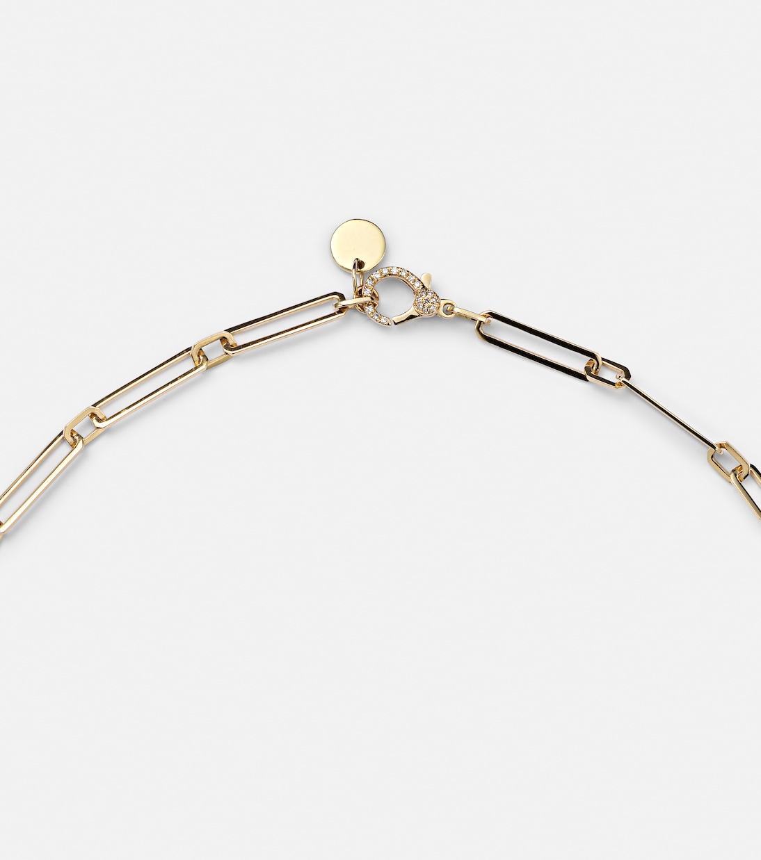 Collana giovanile in oro 18kt con pendente diamantato a forma ottagonale, design moderno e brillante.