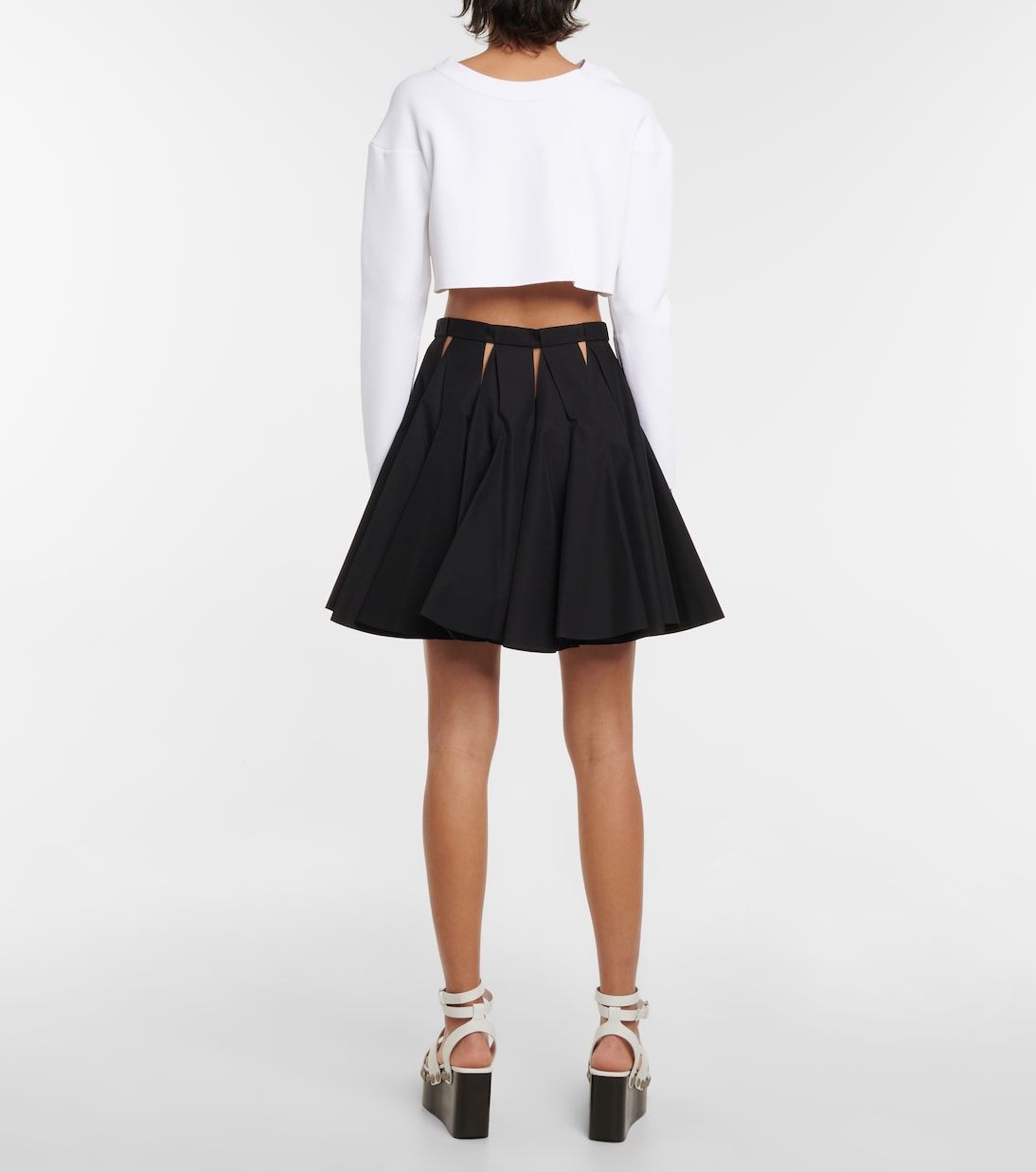 Minigonna in cotone con cut-out | Alaïa
