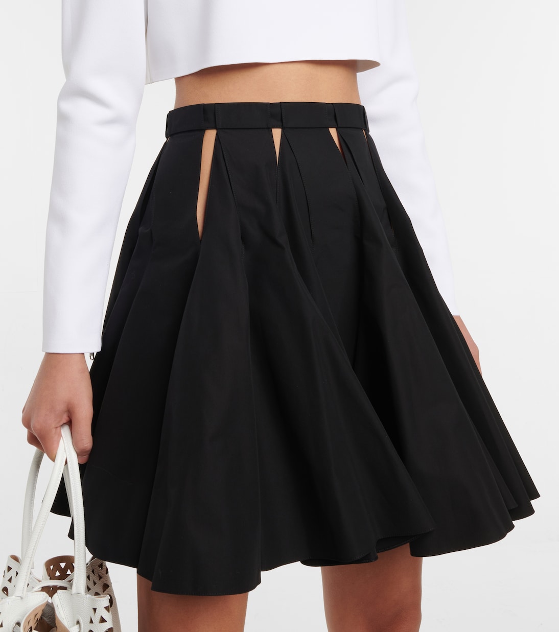 Minigonna in cotone con cut-out | Alaïa