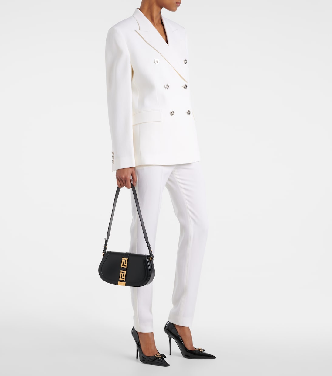 Pantaloni slim in lana a vita alta | Versace