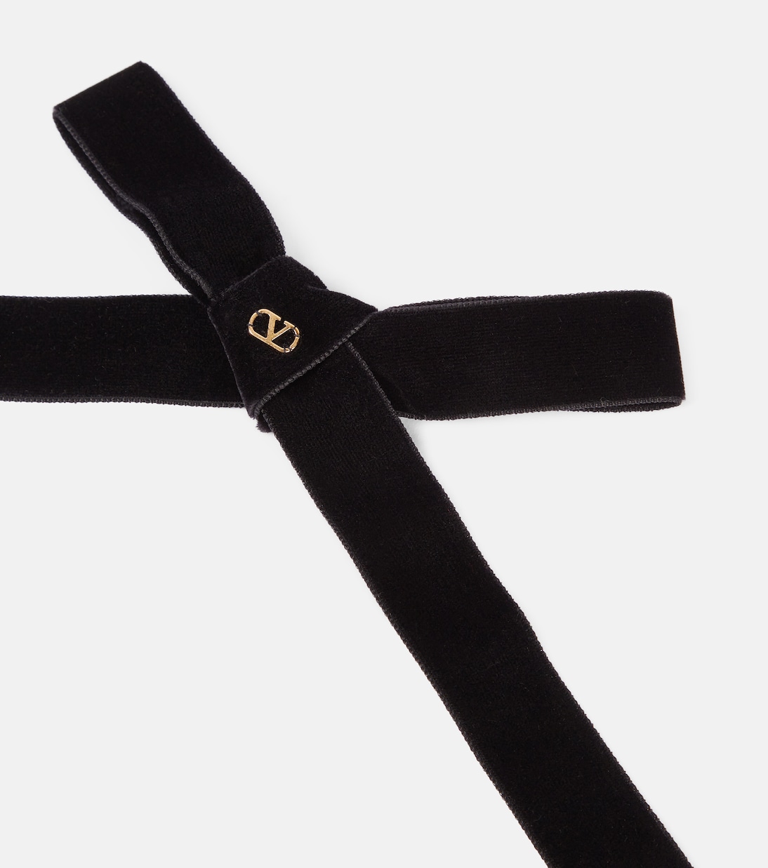 Fermaglio in velluto con logo V di Valentino, accessorio trendy per giovani