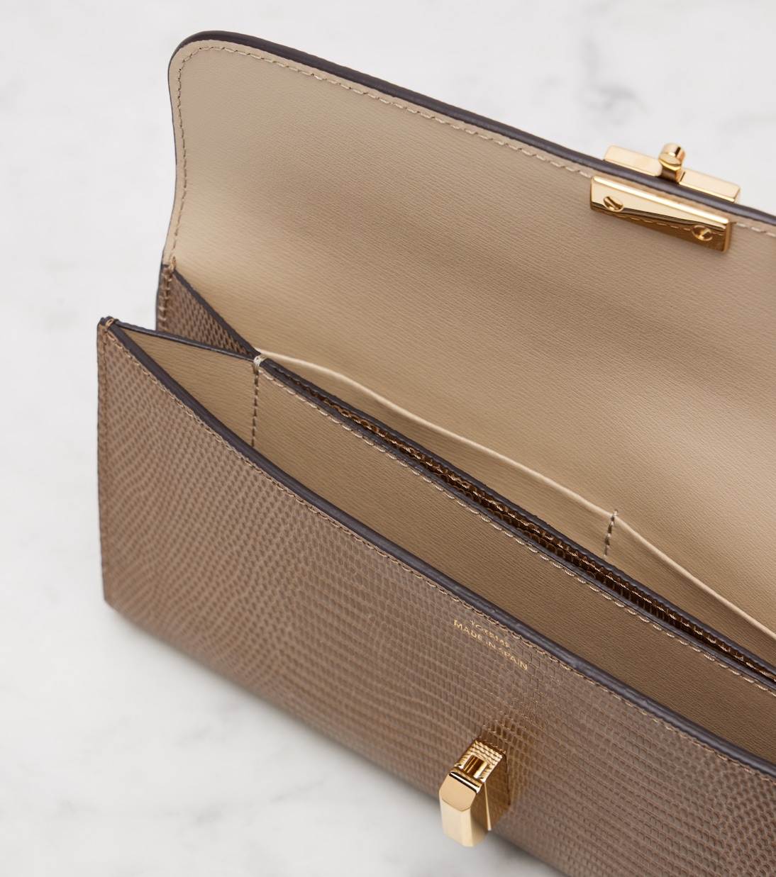 T-Lock embossed leather wallet | Toteme