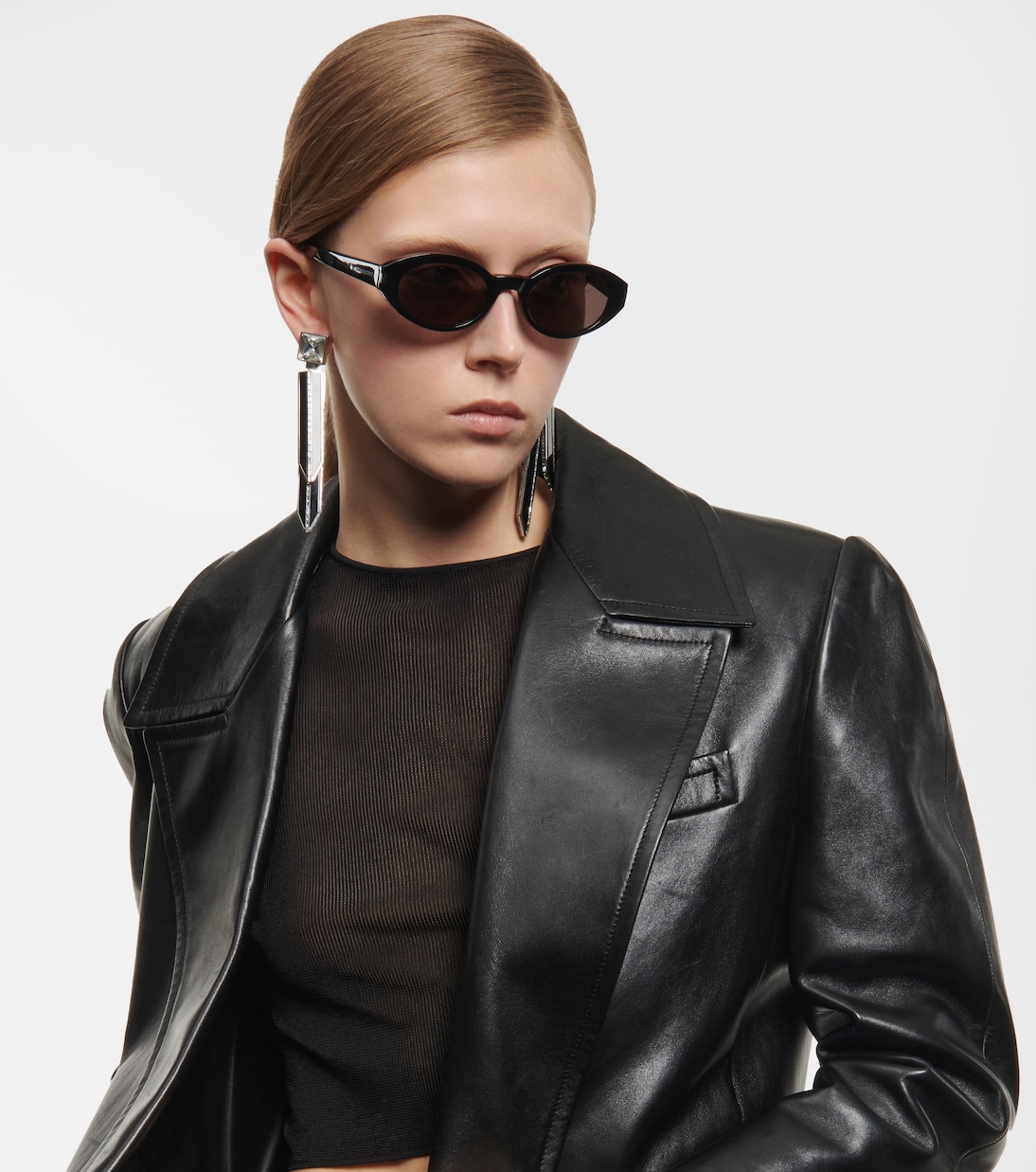 Oval acetate sunglasses in black Saint Laurent Mytheresa