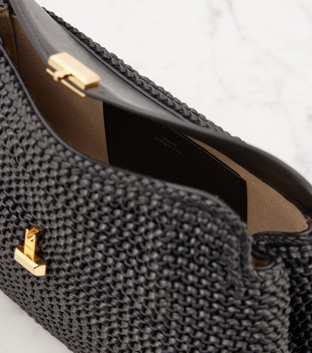 Clutch T-Lock in pelle | Toteme