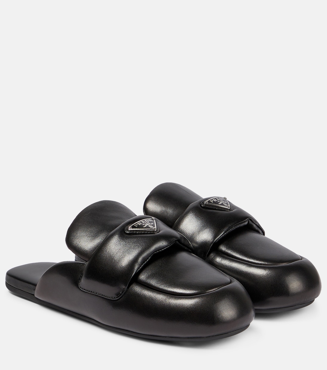 Padded leather slippers in black Prada Mytheresa
