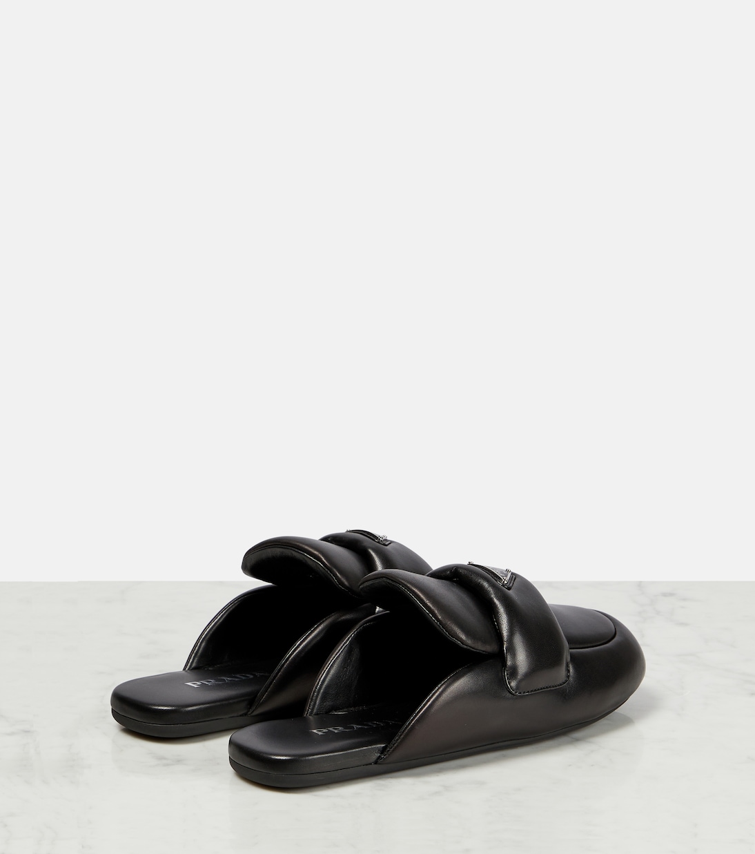 Slippers in pelle imbottite | Prada