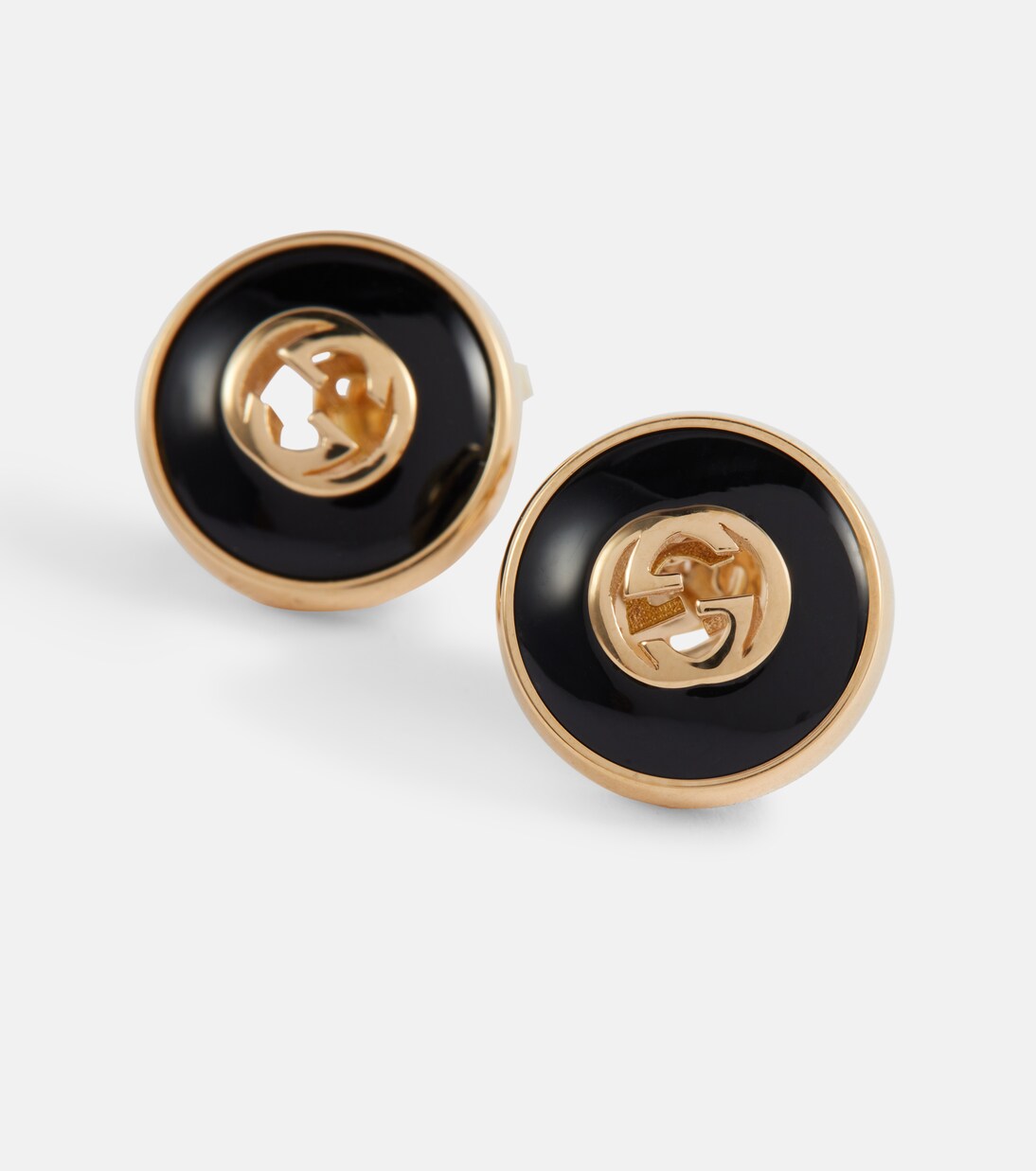 Orecchini Interlocking G in oro 18kt con onice | Gucci