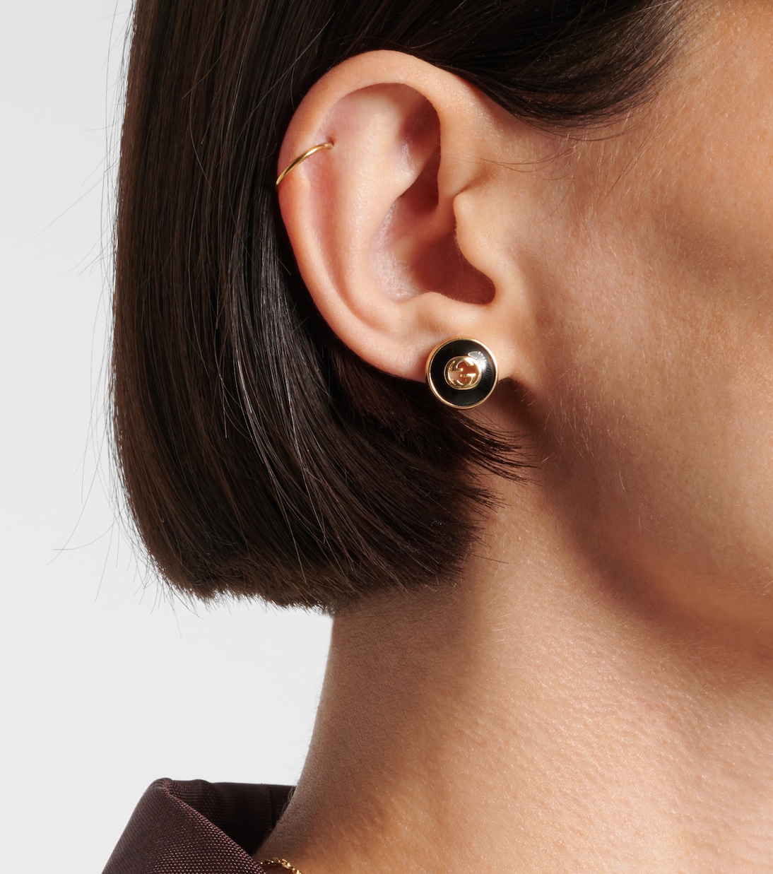 Orecchini Interlocking G in oro 18kt con onice | Gucci