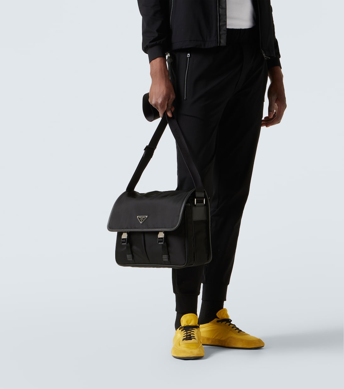 Re-Nylon leather-trimmed messenger bag | Prada