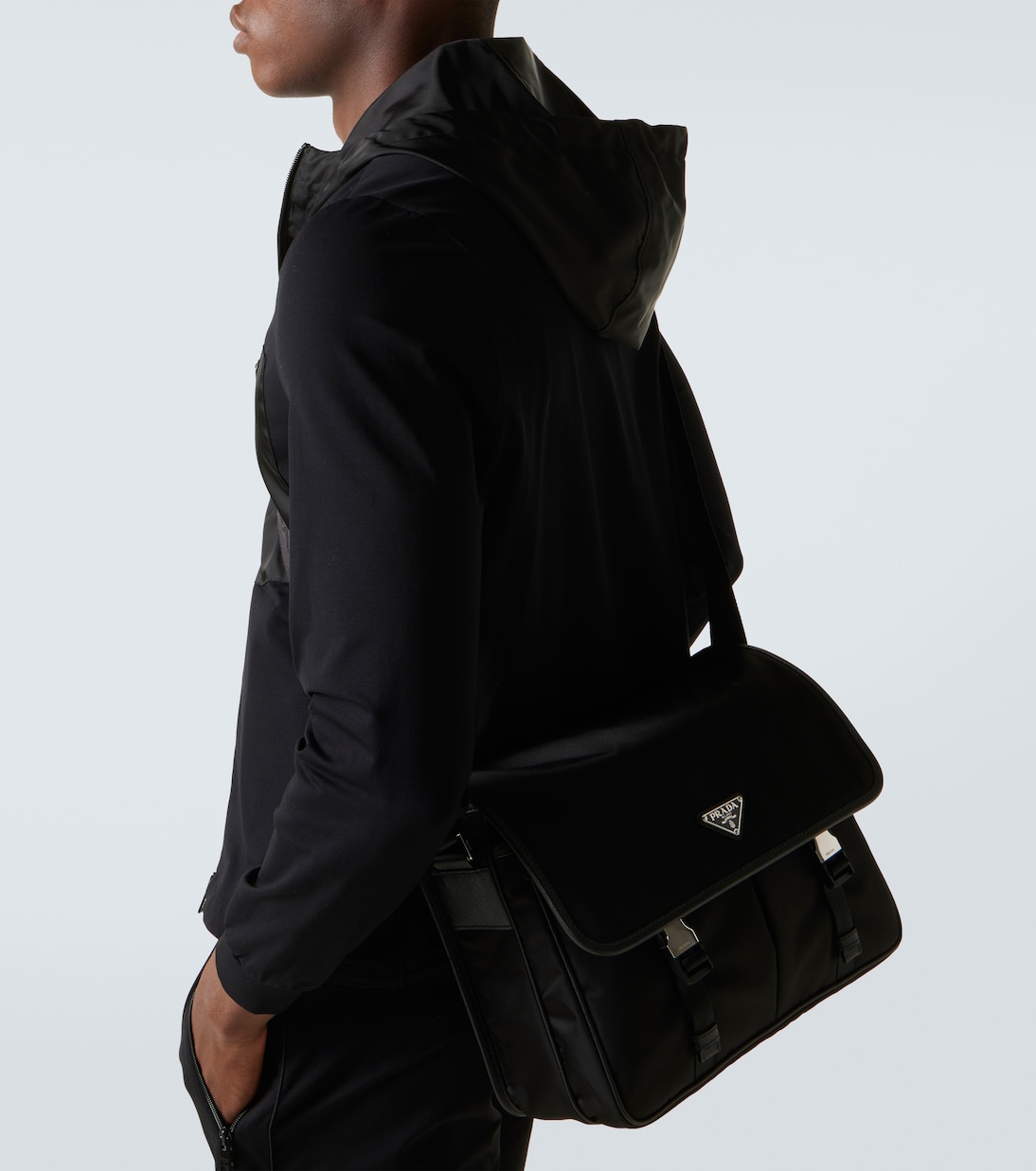 Re-Nylon leather-trimmed messenger bag | Prada