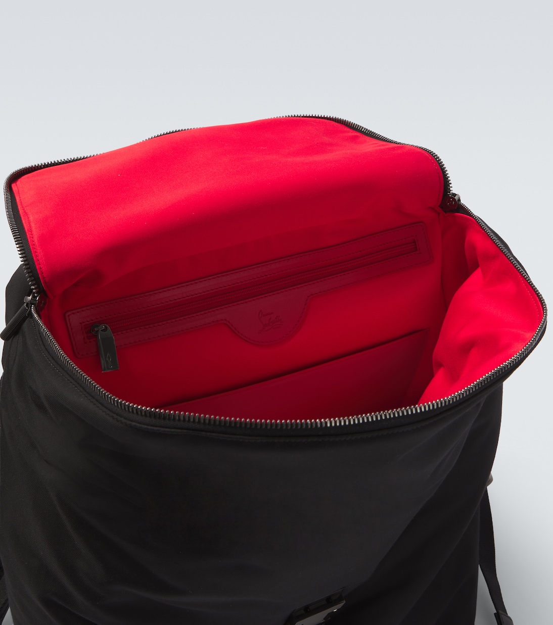 Nox leather-trimmed backpack | Christian Louboutin