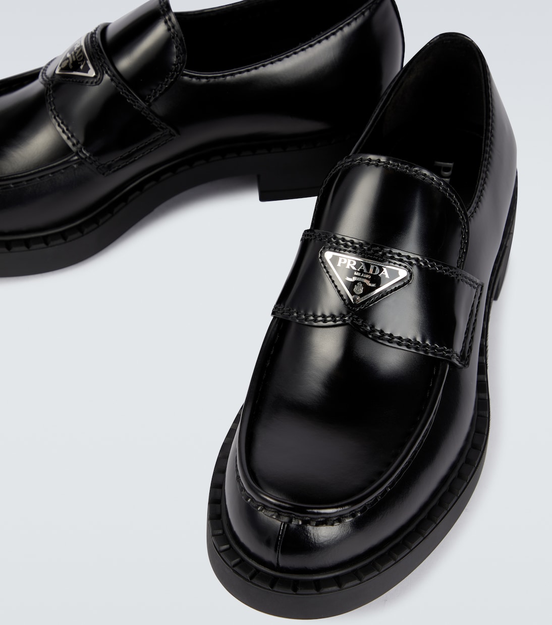 Brushed leather loafers in black Prada Mytheresa