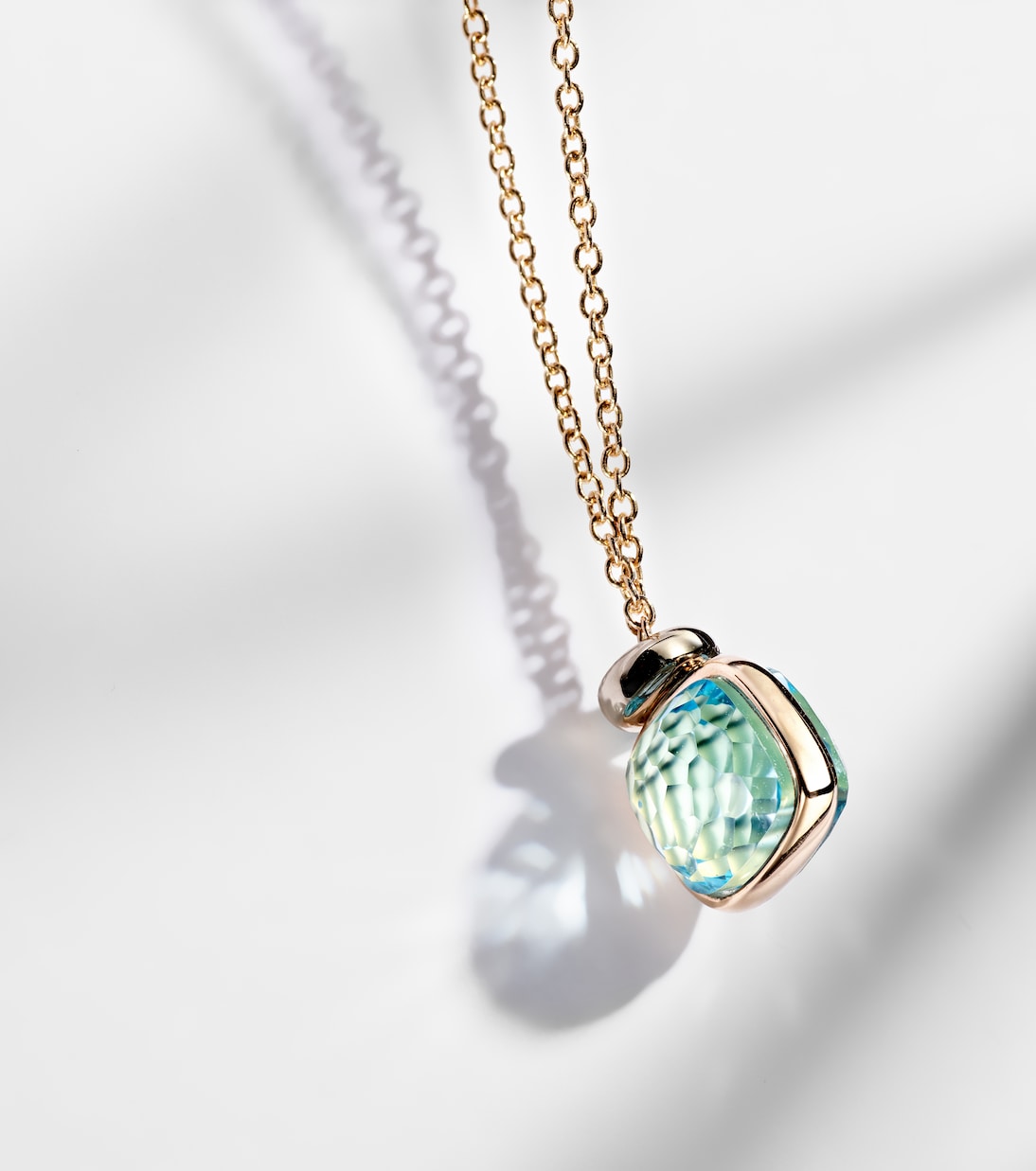 Nudo Mini 18kt rose gold pendant necklace with topaz and diamonds | Pomellato