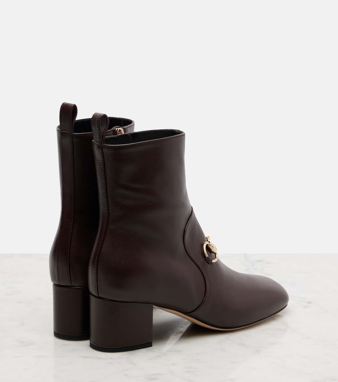 Horsebit leather ankle boots | Gucci