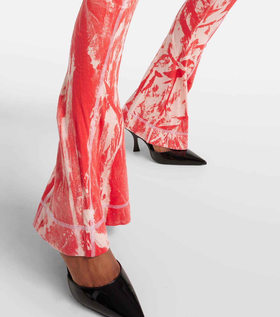 Raze low-rise tie-dye flared pants | KNWLS