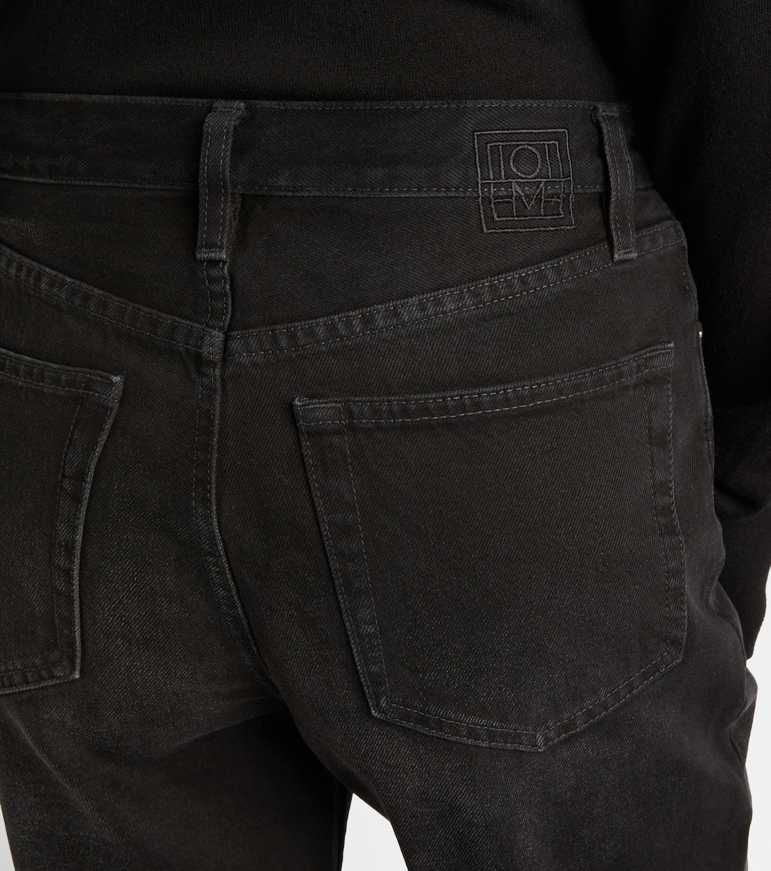 Jeans rectos con efecto desgastado | Toteme