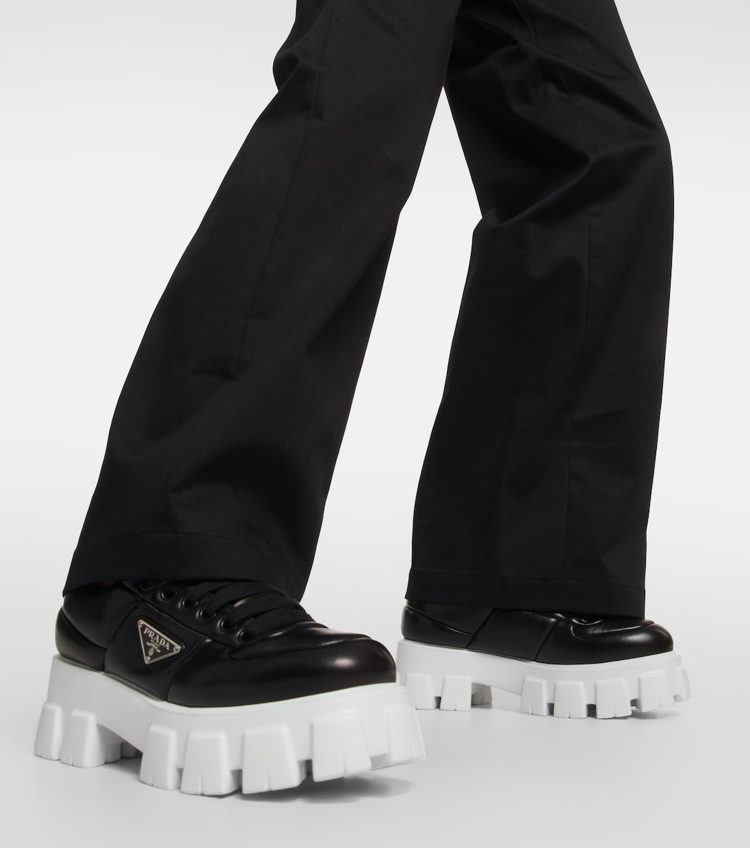 Sneakers in nappa imbottita con platform | Prada