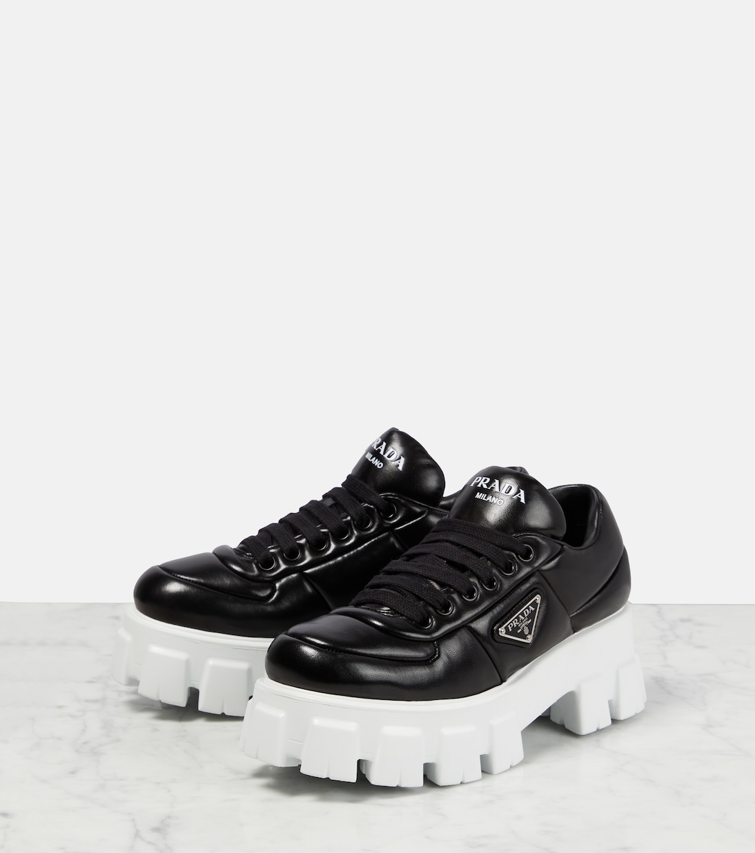 Sneakers in nappa imbottita con platform | Prada