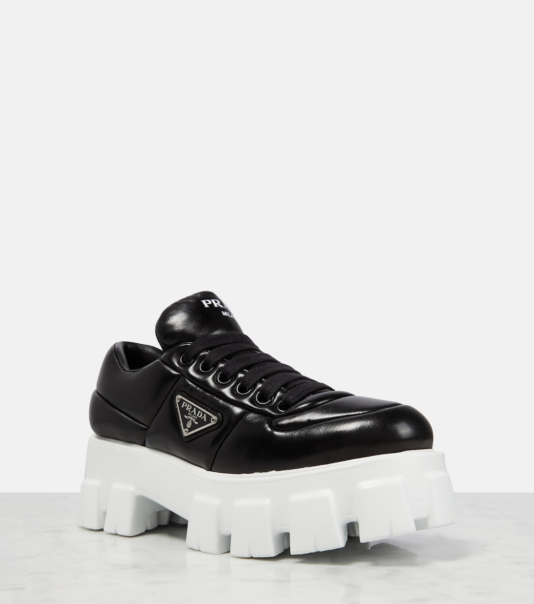 Sneakers in nappa imbottita con platform | Prada