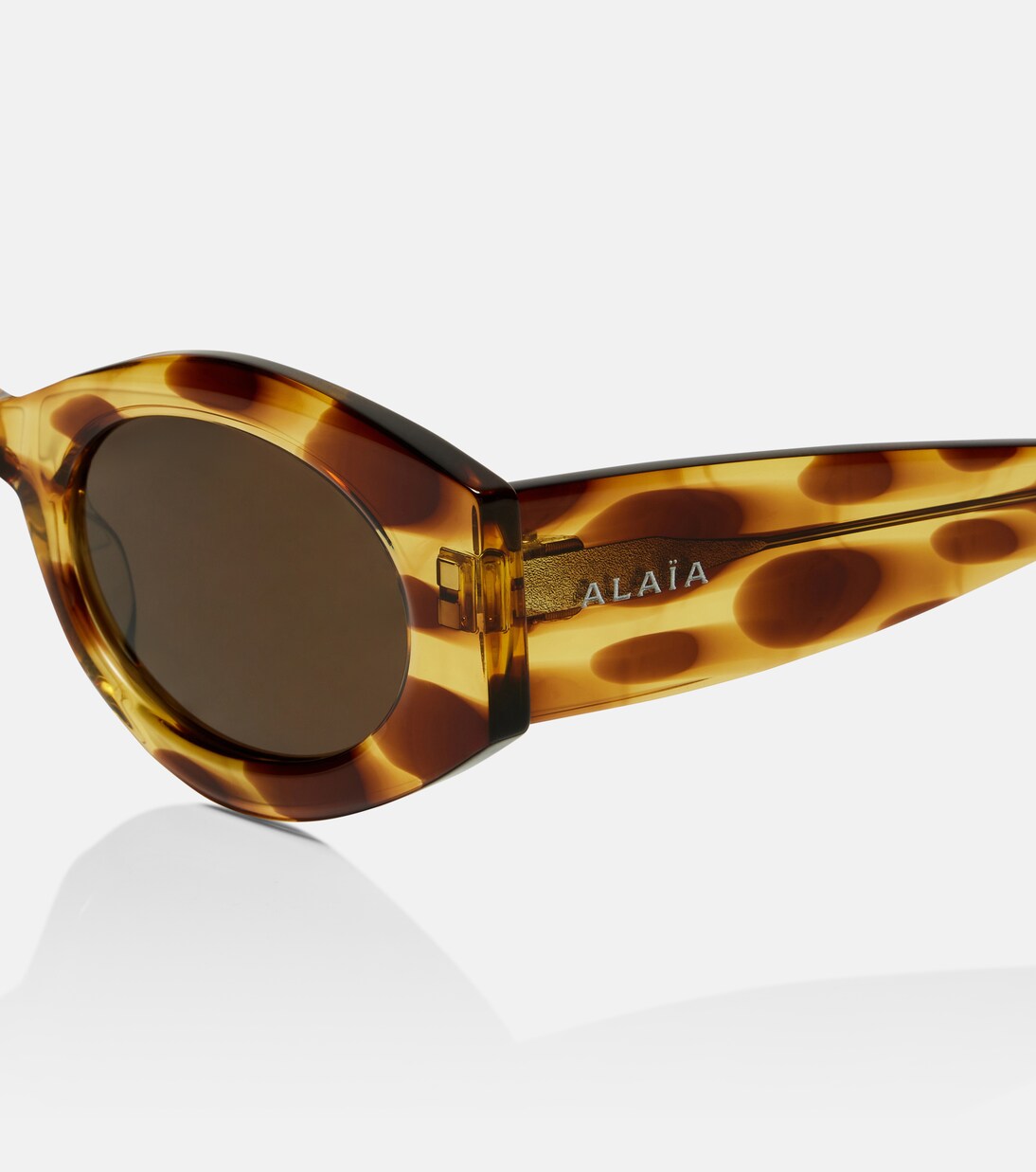 Logo oval sunglasses | Alaïa