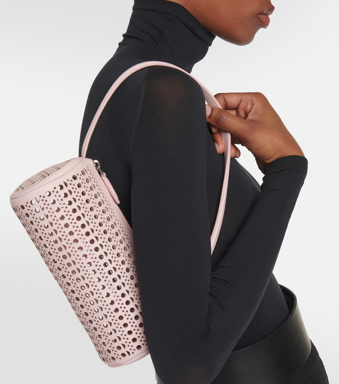 Tube perforated leather shoulder bag | Alaïa