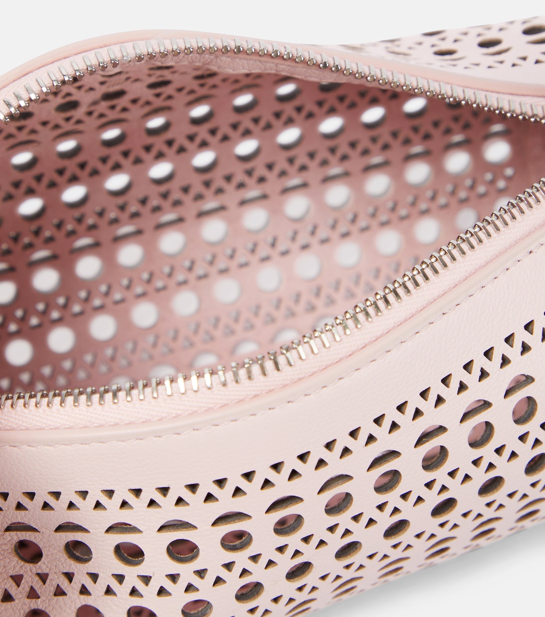 Tube perforated leather shoulder bag | Alaïa